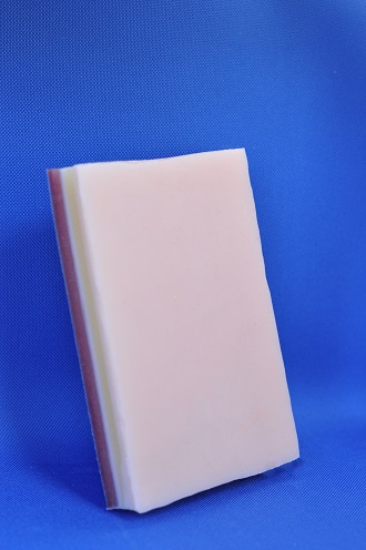 Multi-Layer Tissue Pad